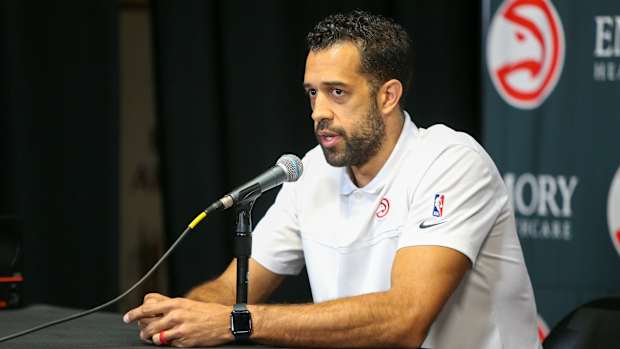 Landry Fields speaks at a press conference.
